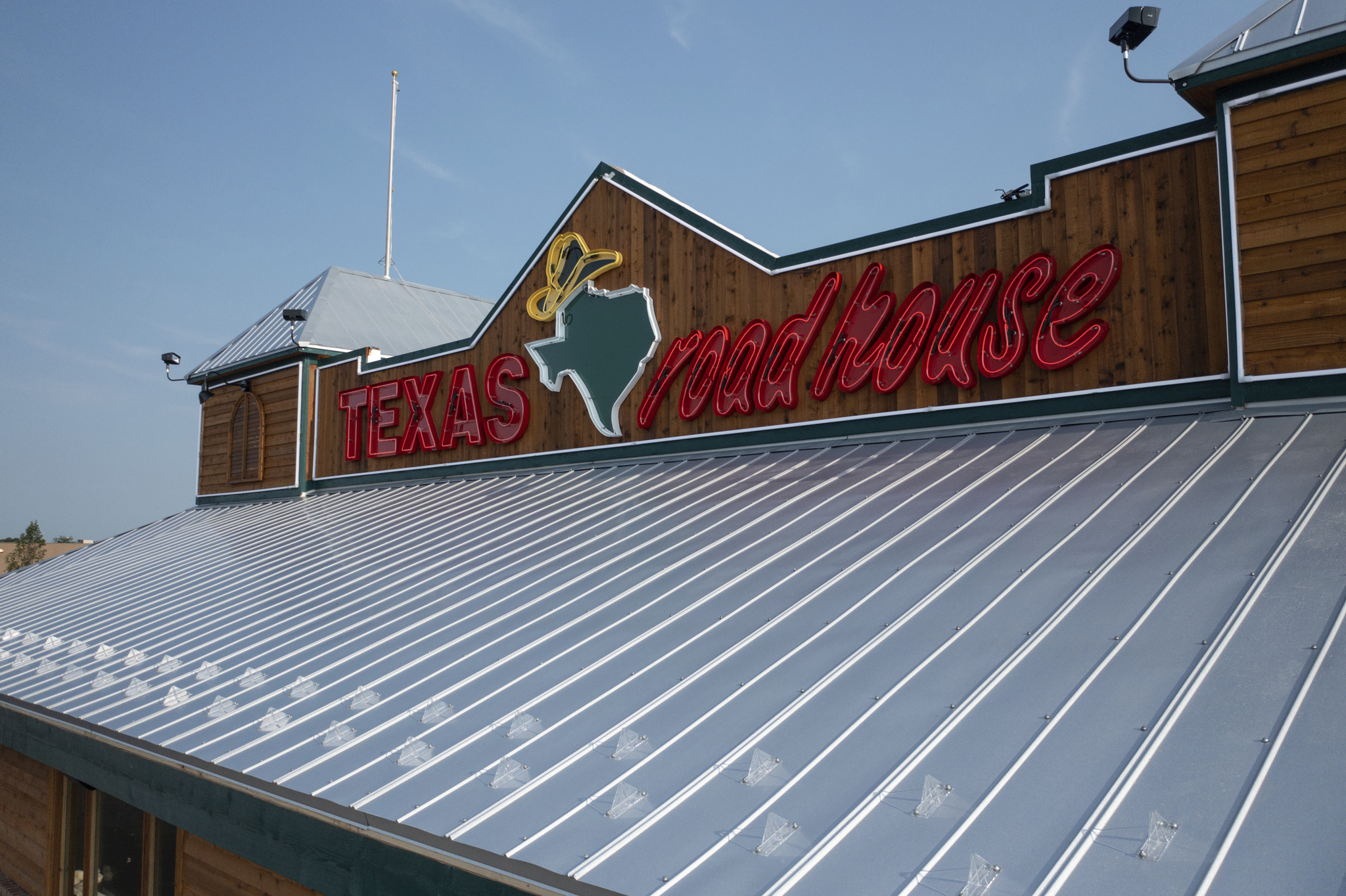 Metal restaurant roof with clear snow guards
